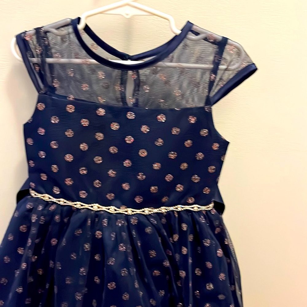 Navy blue dress with golden Polkadots.